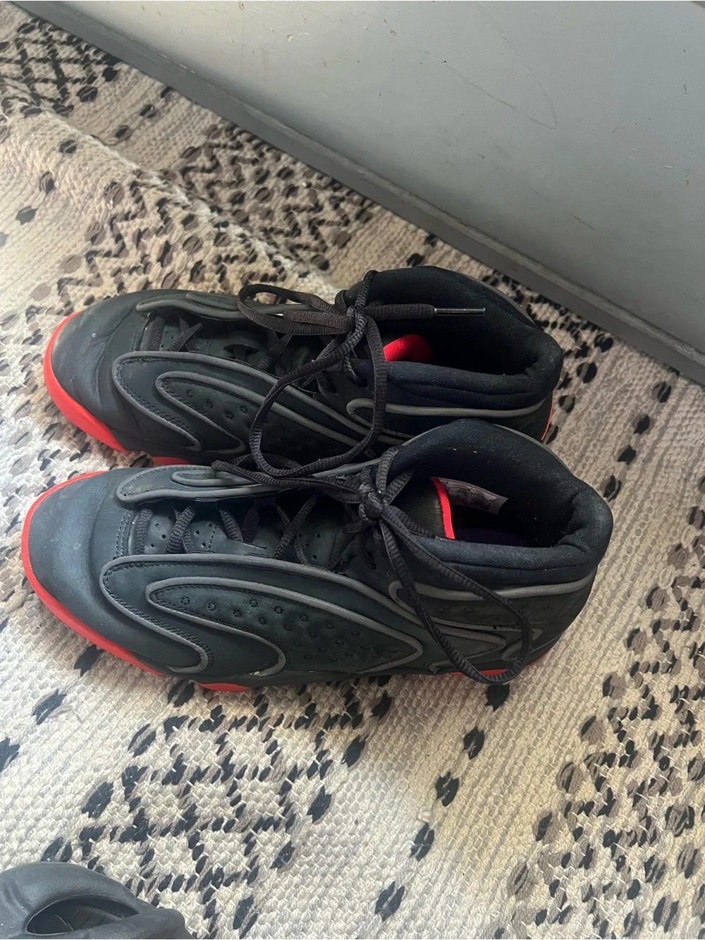 Melody Ehsani Jordan Black and Red High-Top Sneakers